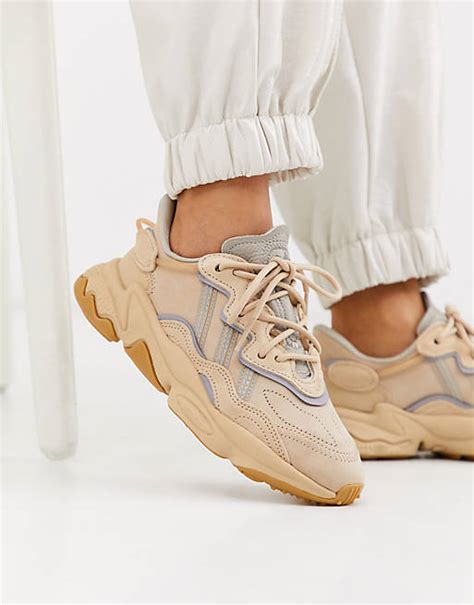 adidas originals trainers in beige outfit